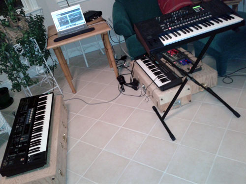 assorted hellothisisalex equipment strewn about a room; we are recording a new album