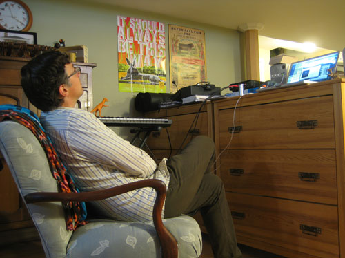 Mark listening to a rough mix.